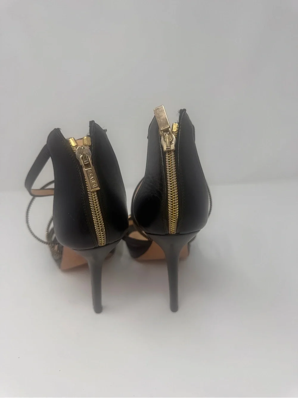 Discontinued designer Esari heels zipper design
